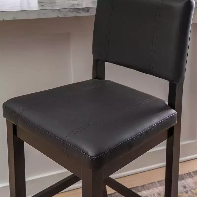 Tabouret de bar en similicuir noir, sans accoudoirs, dossier mi-hauteur, 1 place