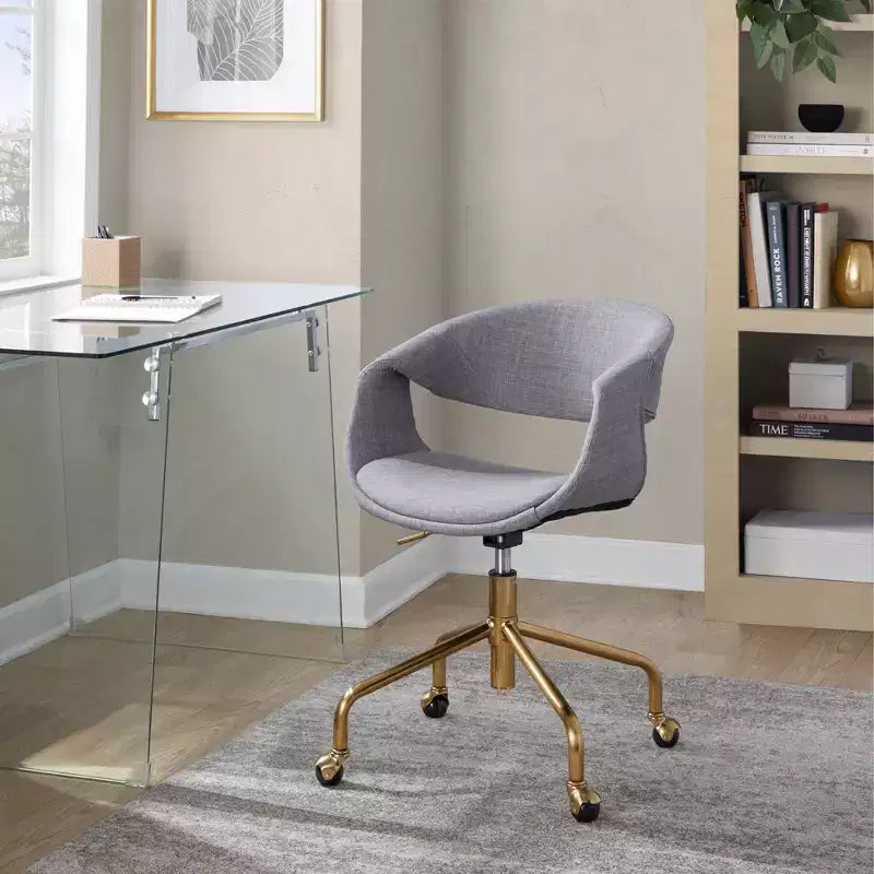 Fauteuil de travail en tissu gris, piètement doré 4 branches, une place